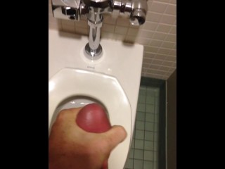 Ejaculation in a public restroom