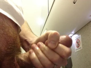 cumming in the airplane bathroom