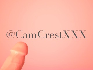 Cam Crest sucking a dildo in a mask