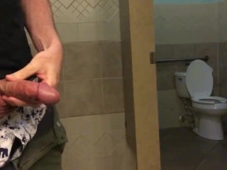 slow motion cumshot from a big dick in a public restroom