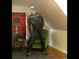 wetsuited lucha libre skeleton masked frogman playing with his cock