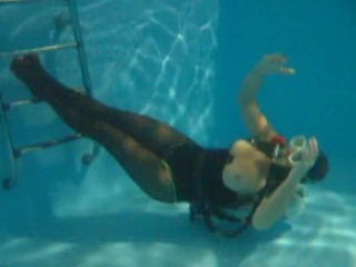 scuba mistress in high heels underwater