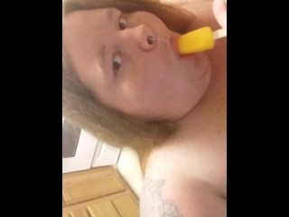 Big, beautiful bitch eating a popsicle naked