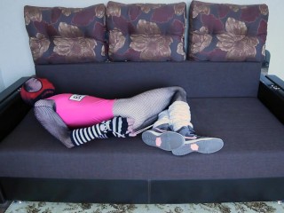 Bondage in loose socks and fishnet bodyhose in swimsuit and sneakers