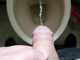 Pulling back my foreskin and pissing