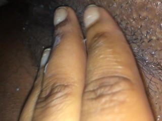 Ebony finger fucks creamy wet pussy