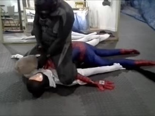 black meshed frogman vs white spandex and spiderman dummy
