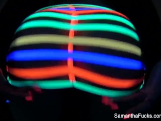 Colorful blacklight teasing with Samantha Saint