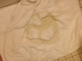 Pissing circles on a towel