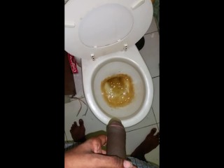 Black teen boy pissing