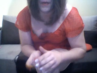 Transsexual smoking cigarette and playing with dick