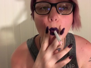Suicide Girl Smokes and Plays With Big Tits