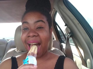 Ebony Big Lips Sucking Ice cream Pop Outside in Car - Cami Creams