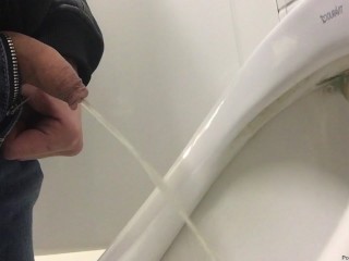 A quick pee in the urinal