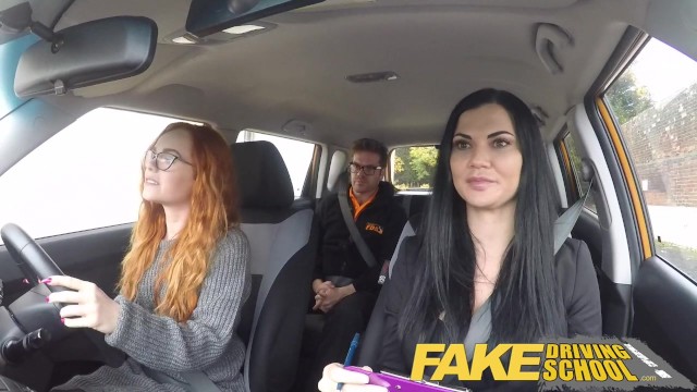 Lesbian strapon 3-way Fake driving school readhead teen lets busty examiner have her way