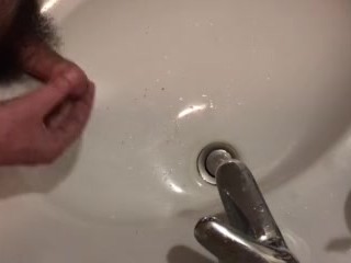 jerking off and cumming in the sink