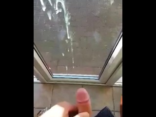 Shooting a huge load against the window