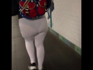 Candid see through white leggings walking through train station