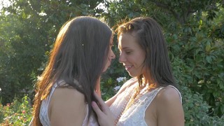 Two young & hot college lesbians outdoors running wild and love each other