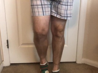 Man Does Calf Flexing With X-Mas Socks