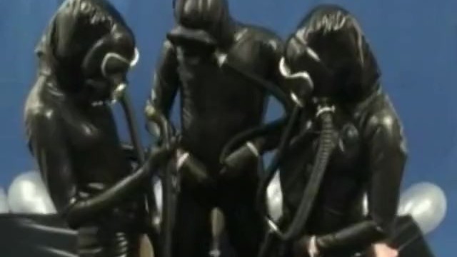 Threesome In Latex Rubber Catisuit Gas Mask Pisspants Make