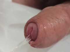 Foreskin pissing and playing. Close up POV