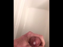 Fit with big dick plays around in the shower and cums all over