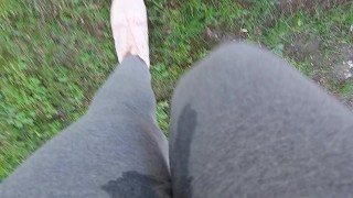 Nicoletta gets her yoga pants completely wet in a public park Extreme pee exposed