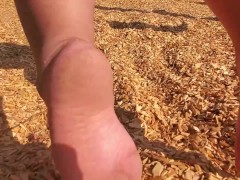 Just Relaxing Barefoot On A Swing