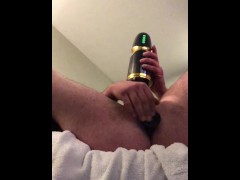 Hot guy strokes his big cock with spinning stroker with plug