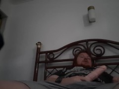 Redhead guy plays with his 10 inch cock
