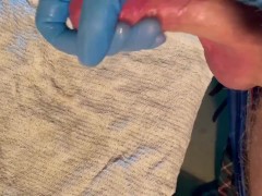 Guy jerks off with latex glove cumshot