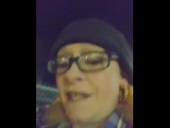 Sexy Smoking Milf in glasses walking the city